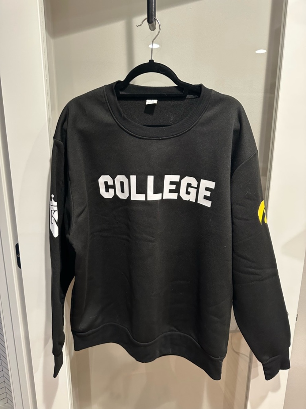 College Graphic Crewneck Sweater - Black with KC Royals and Iowa Hawkeye logos